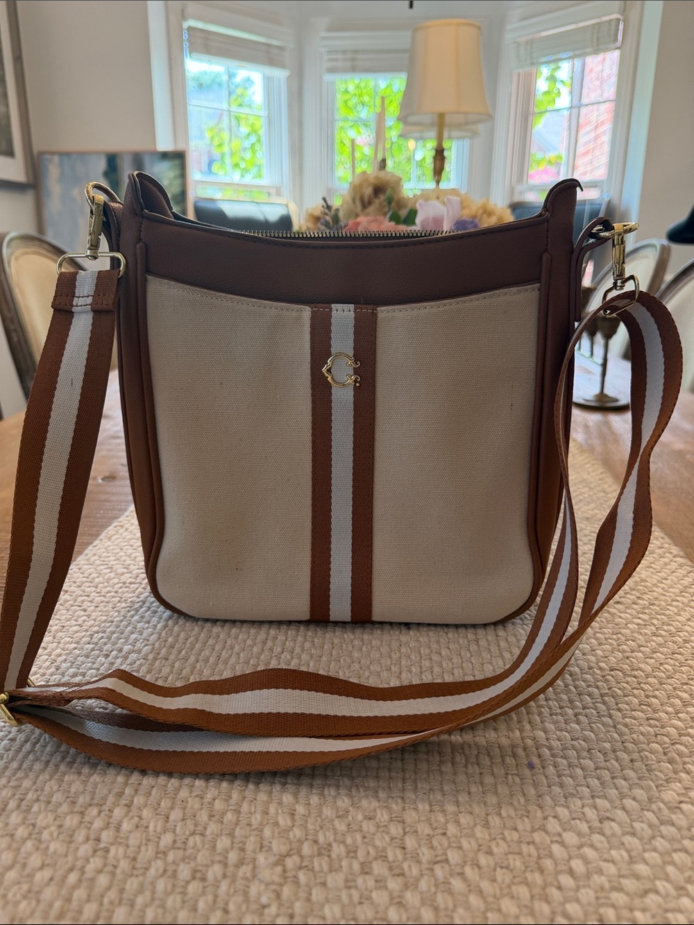 C. Wonder Beige Canvas Crossbody with Brown Trim and Striped Strap